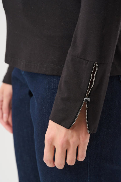 263103 Top aderente in jersey con collo lupetto